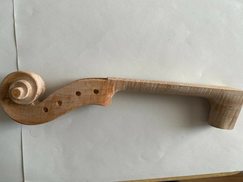 Hand carved violin scroll - hand,